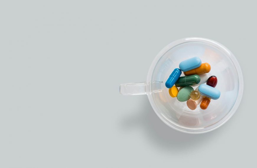 vitamin-tablets-in-a-glass-cup